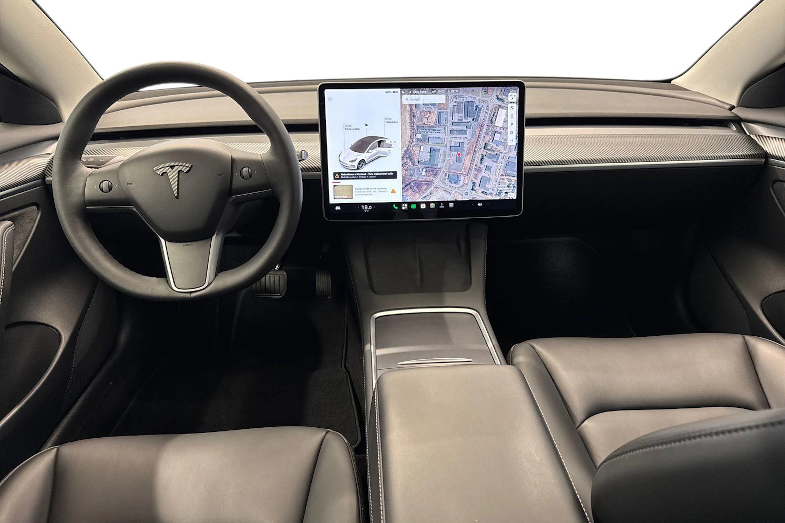 valkoinen Tesla Model 3 2021 kuva 7.