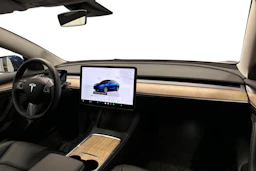 sininen Tesla Model 3 2022 kuva 9.