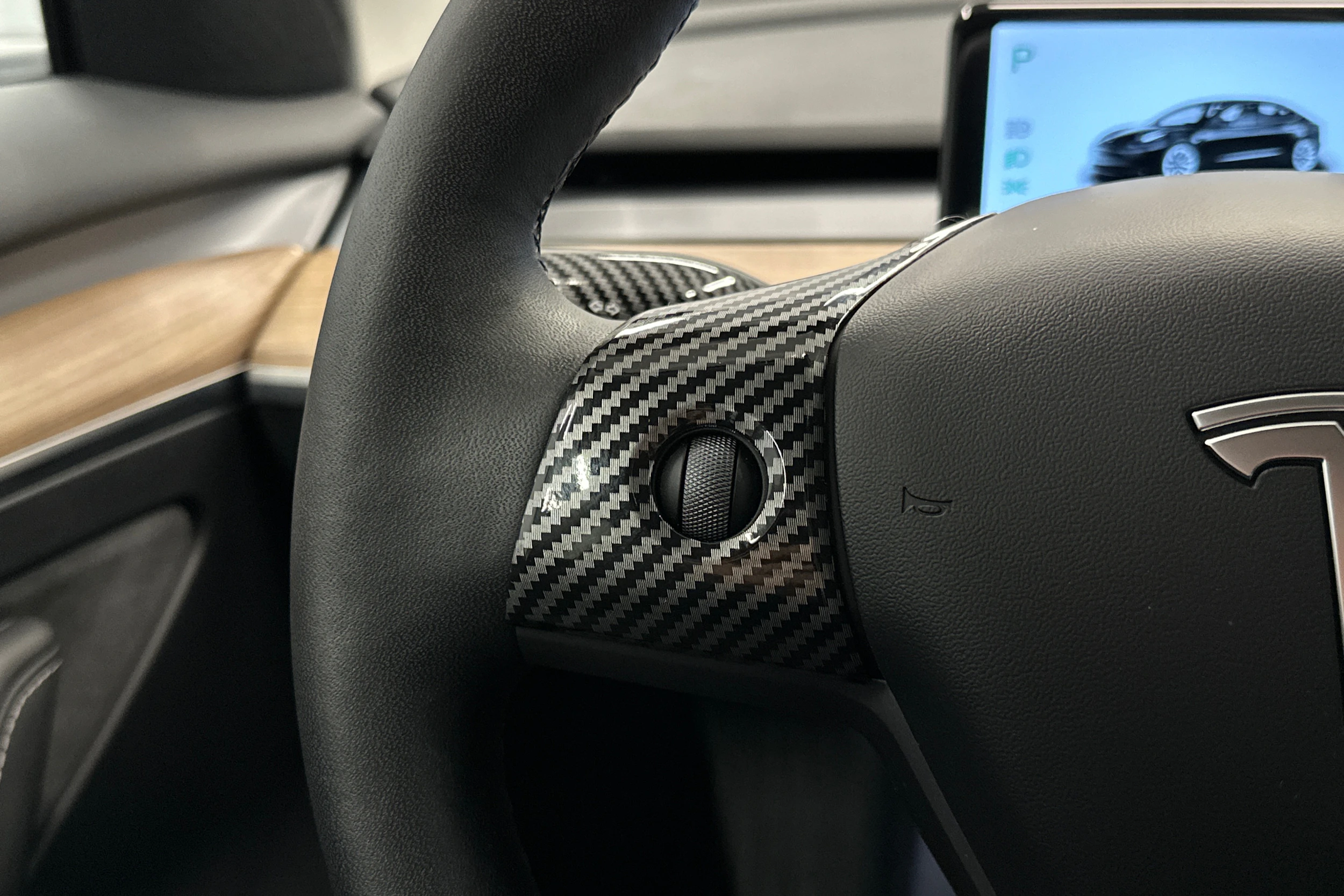 sininen Tesla Model 3 2022 kuva 20.