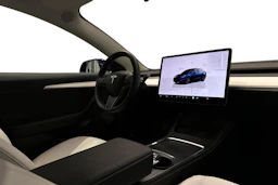 sininen Tesla Model 3 2023 kuva 7.