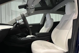 sininen Tesla Model 3 2023 kuva 21.