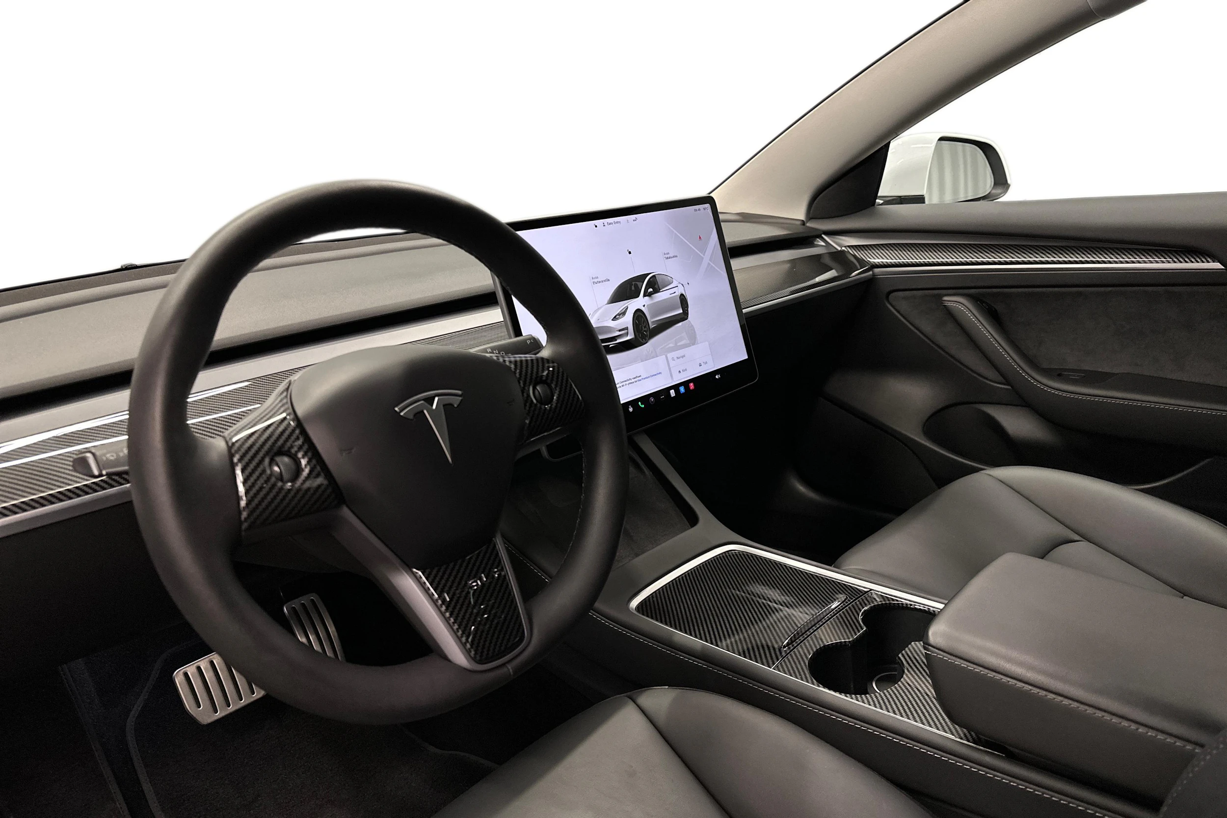 valkoinen Tesla Model 3 2023 kuva 8.