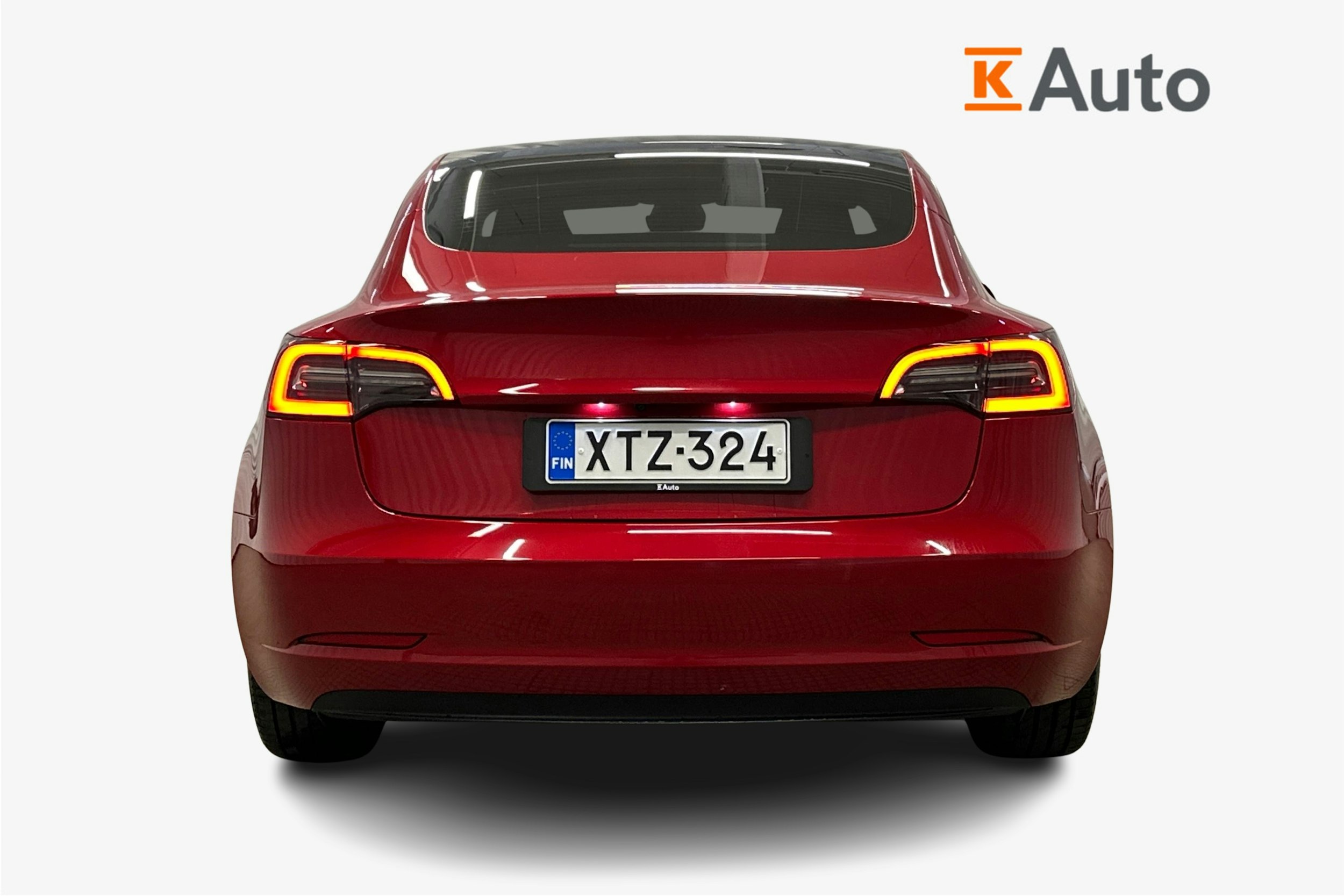 punainen Tesla Model 3 2023 kuva 3.
