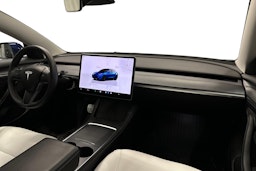 sininen Tesla Model 3 2023 kuva 7.