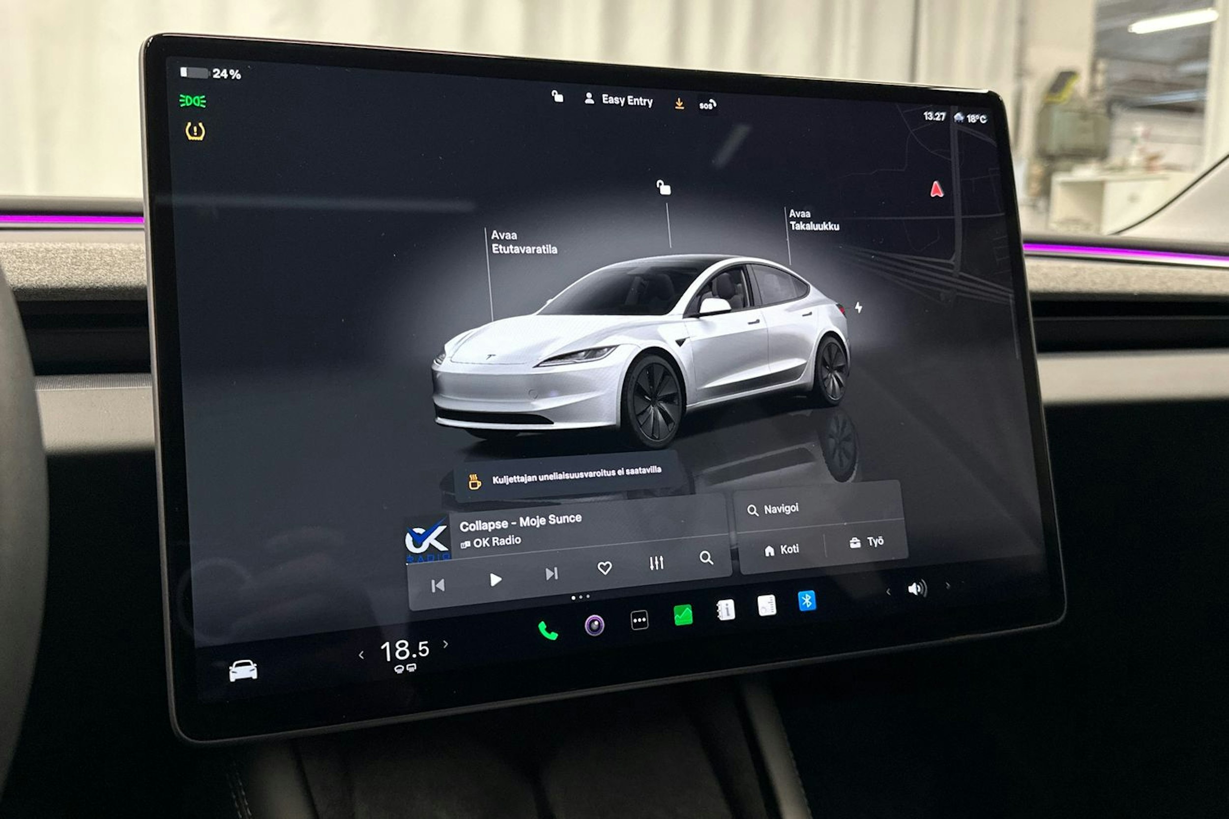 valkoinen Tesla Model 3 2024 kuva 27.