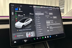 valkoinen Tesla Model 3 2024 kuva 30.