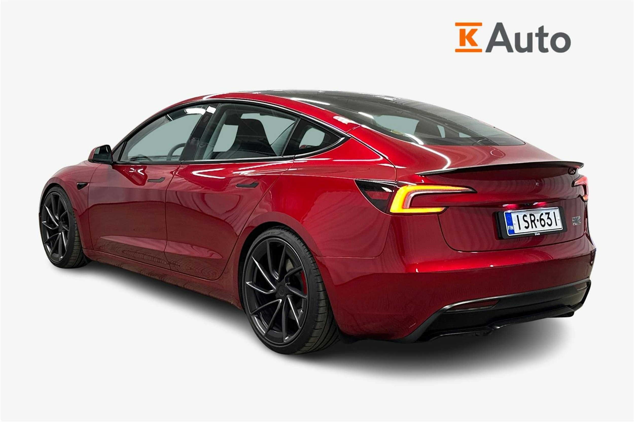 punainen Tesla Model 3 2024 kuva 2.