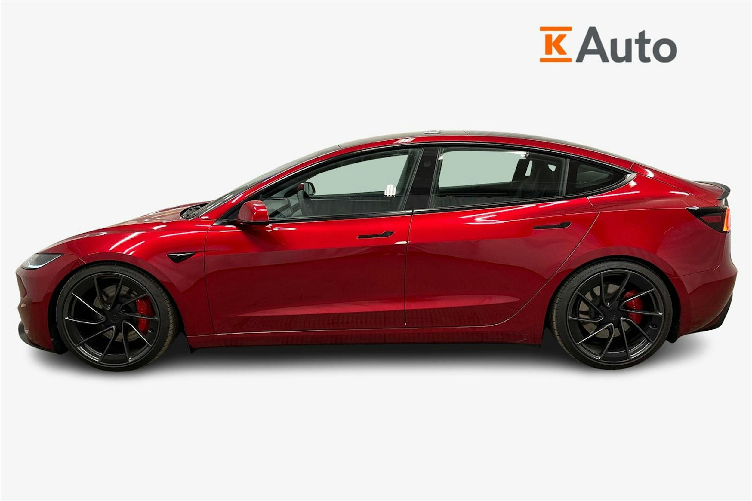 punainen Tesla Model 3 2024 kuva 5.
