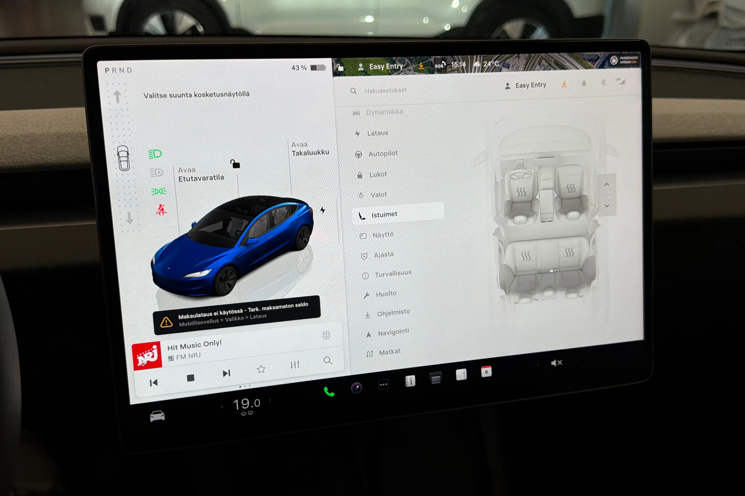 sininen Tesla Model 3 2024 kuva 28.