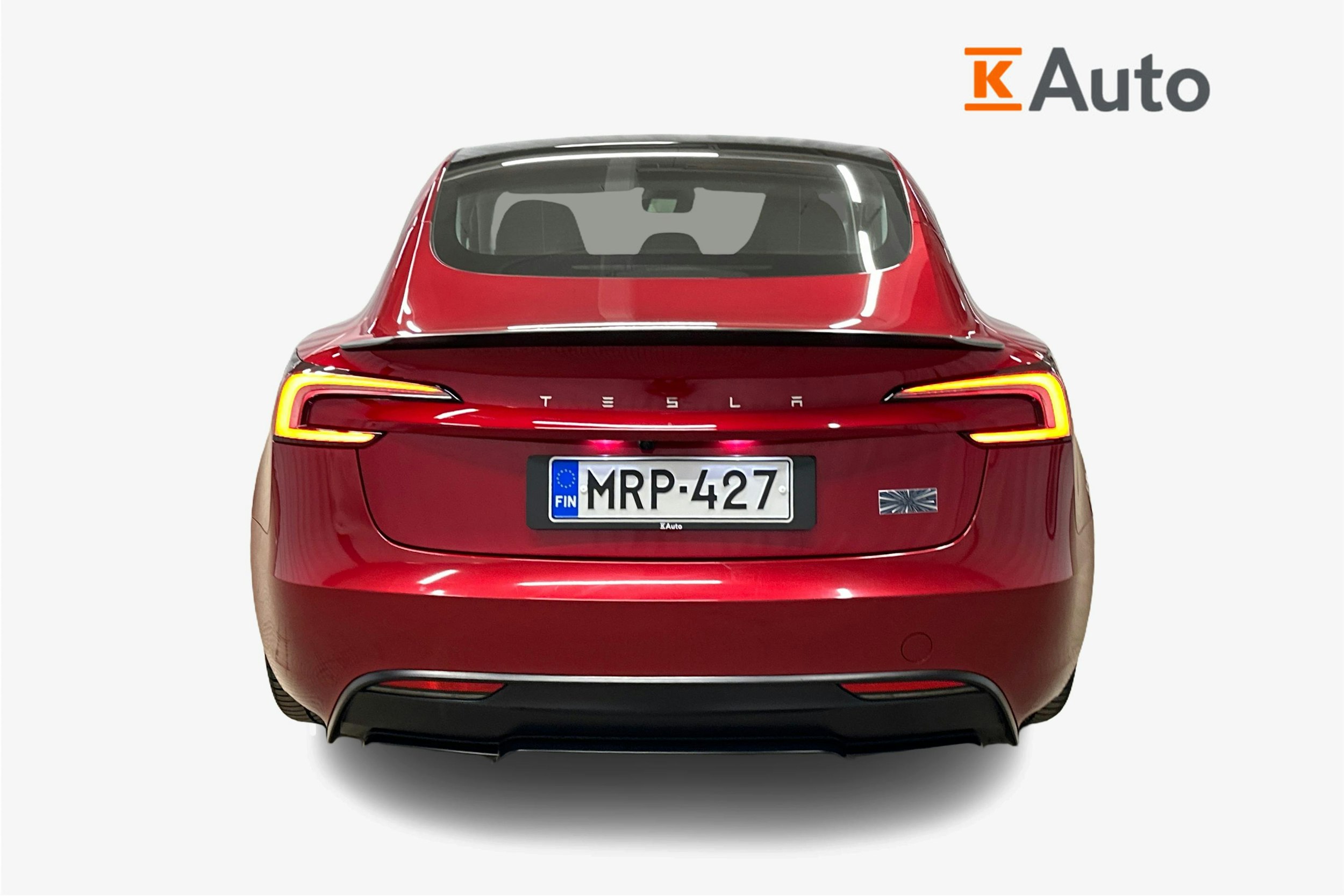 punainen Tesla Model 3 2024 kuva 3.