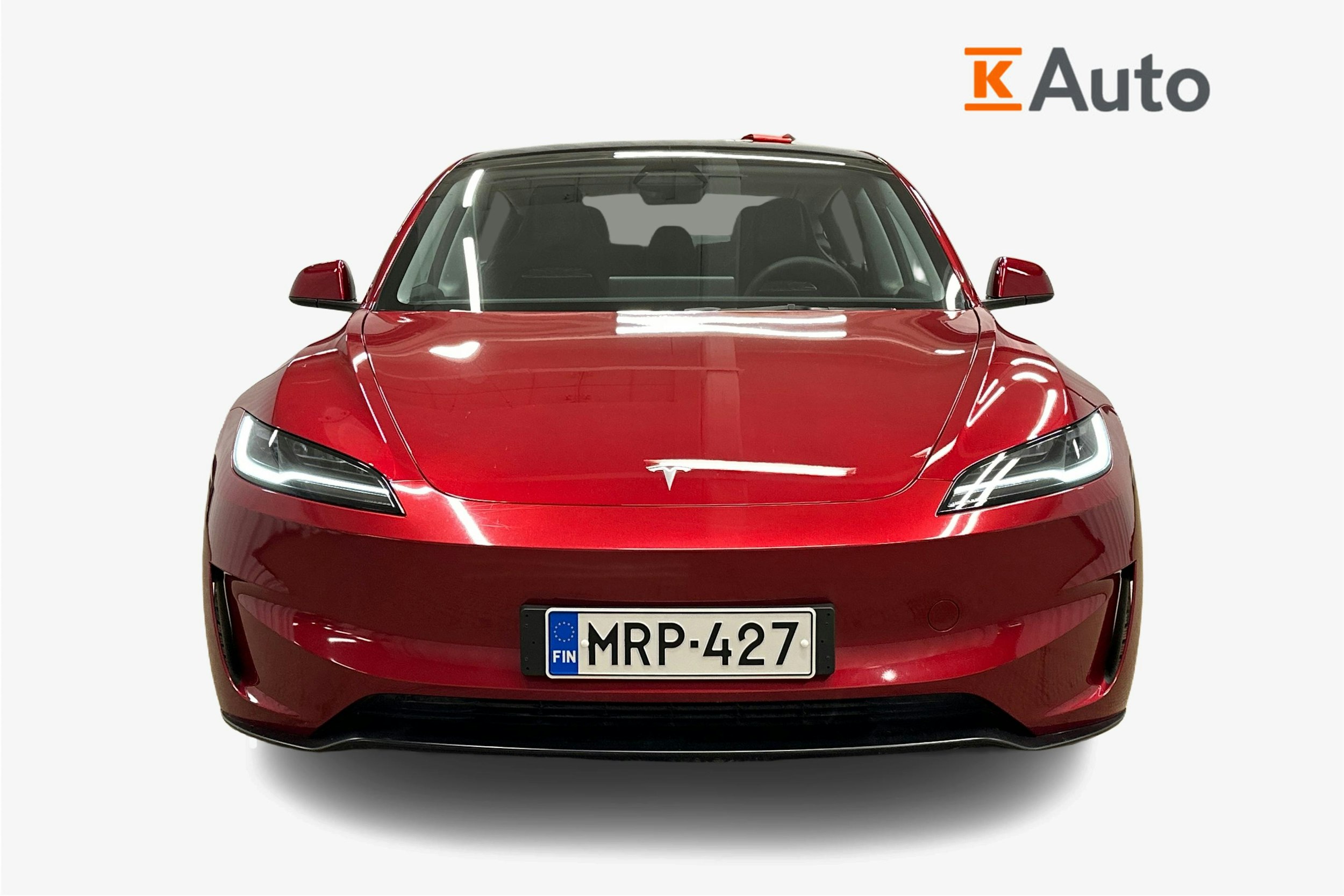 punainen Tesla Model 3 2024 kuva 5.