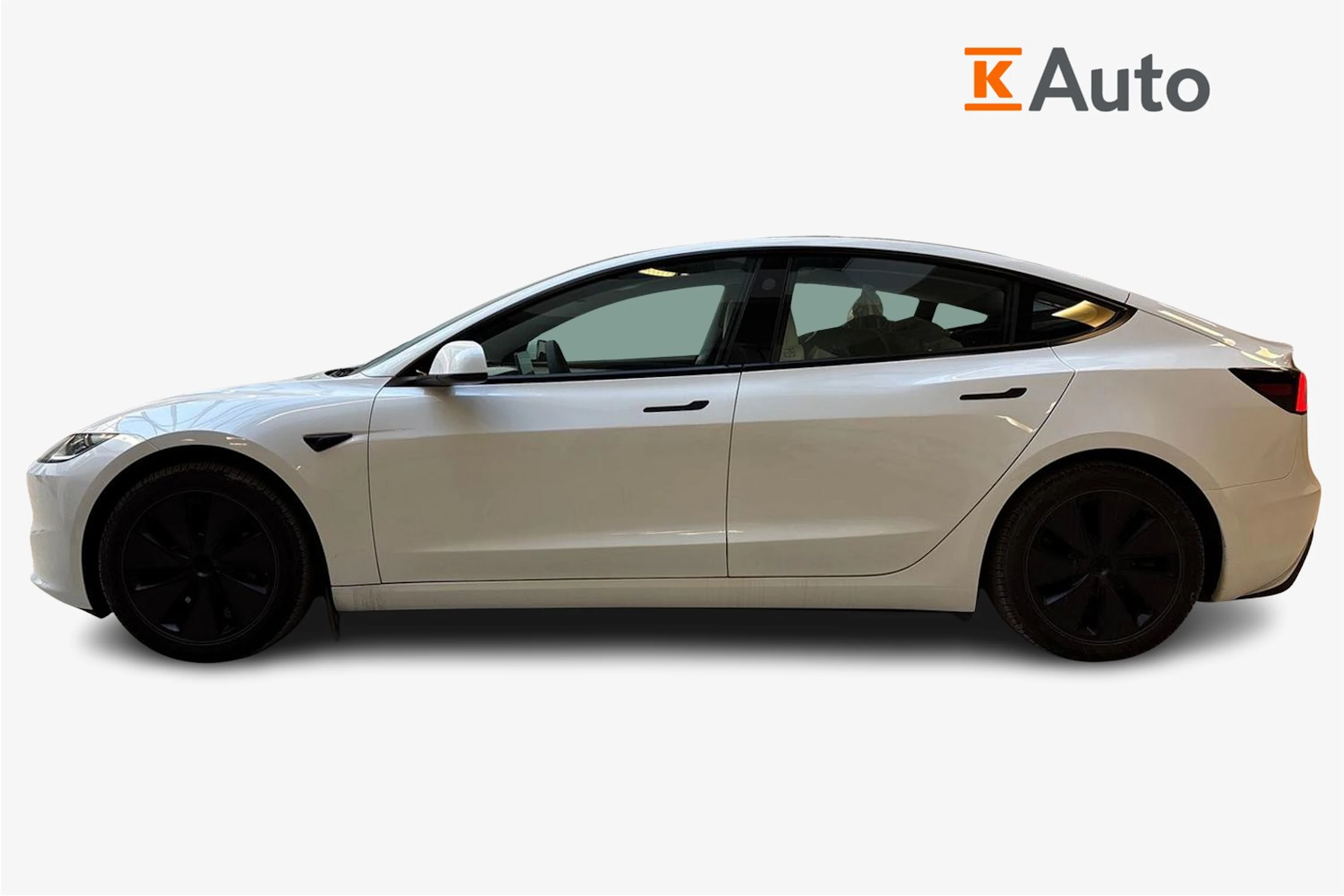 valkoinen Tesla Model 3 2024 kuva 5.