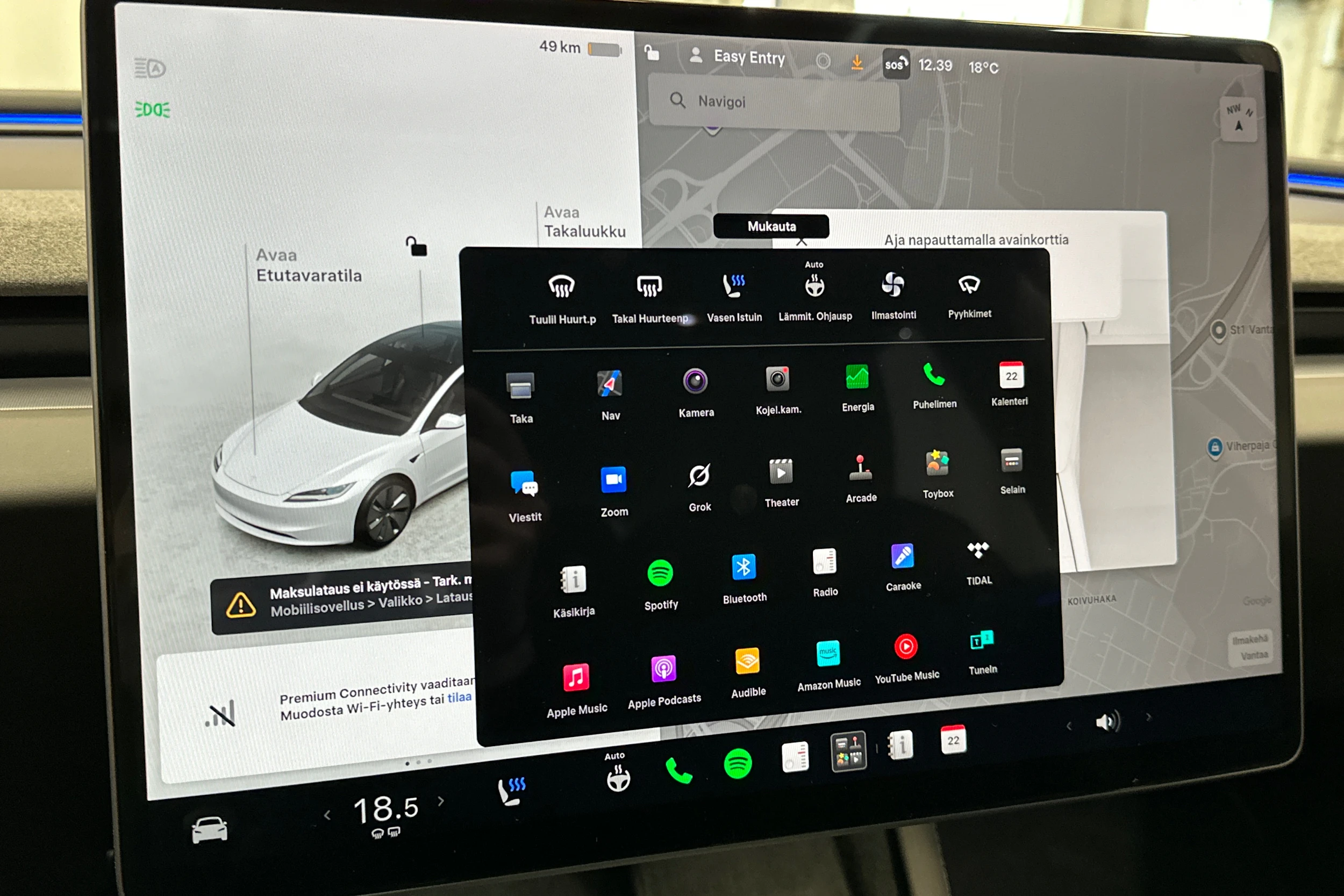 valkoinen Tesla Model 3 2024 kuva 33.