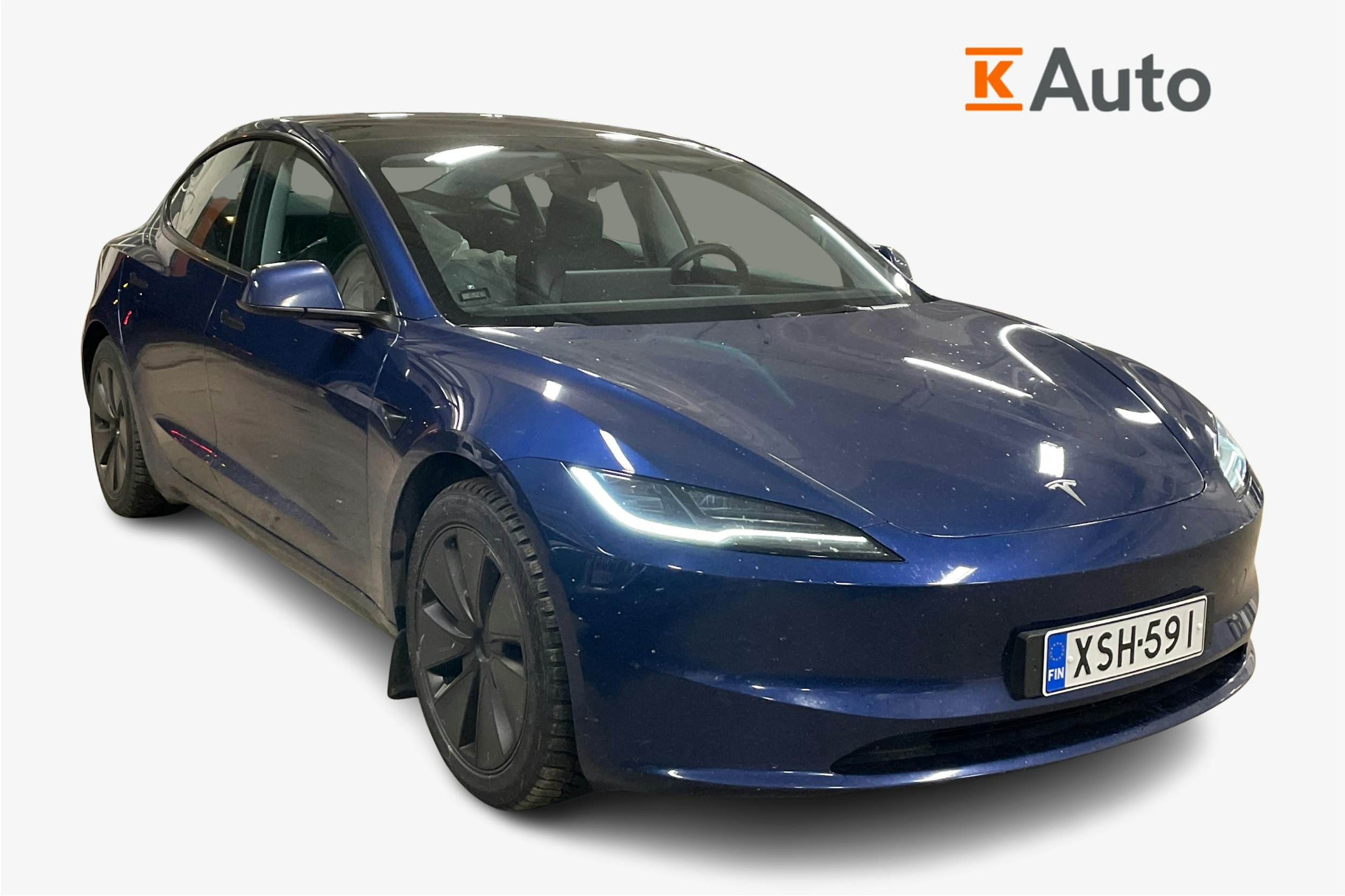 sininen Tesla Model 3 2024 kuva 1.