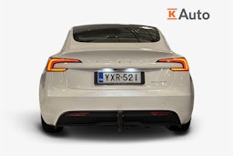 valkoinen Tesla Model 3 2024 kuva 3.