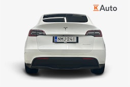 valkoinen Tesla Model Y 2021 kuva 3.
