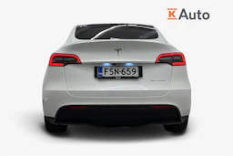 valkoinen Tesla Model Y 2022 kuva 4.