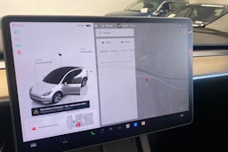 valkoinen Tesla Model Y 2022 kuva 19.