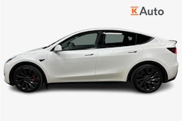 valkoinen Tesla Model Y 2022 kuva 6.