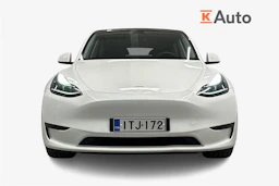 valkoinen Tesla Model Y 2022 kuva 4.
