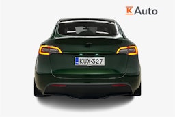 Sininen Tesla Model Y 2022 kuva 3.