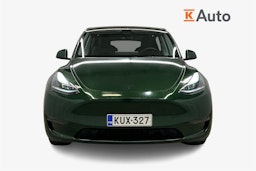 Sininen Tesla Model Y 2022 kuva 5.