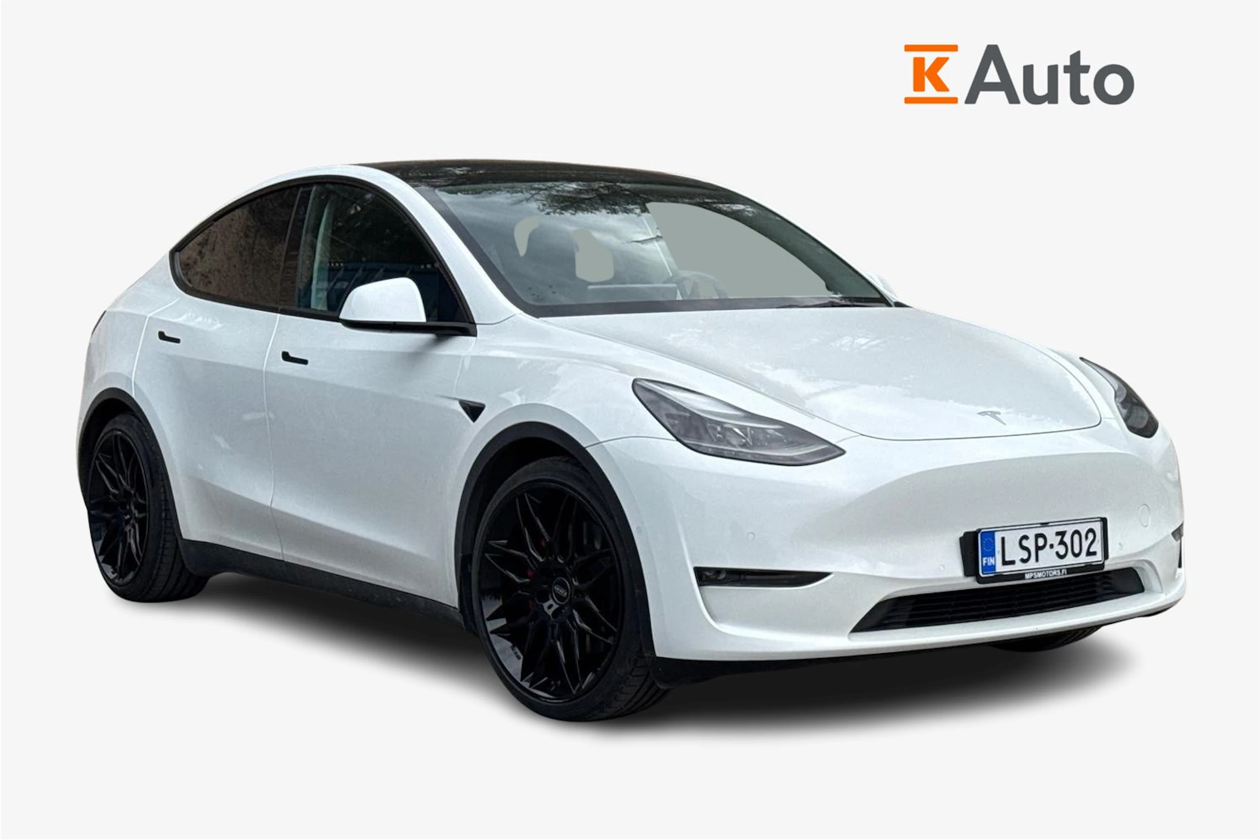 valkoinen Tesla Model Y 2022 kuva 1.