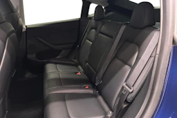 sininen Tesla Model Y 2022 kuva 8.