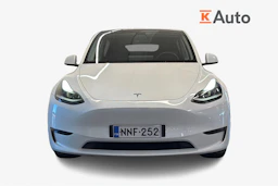 valkoinen Tesla Model Y 2022 kuva 4.