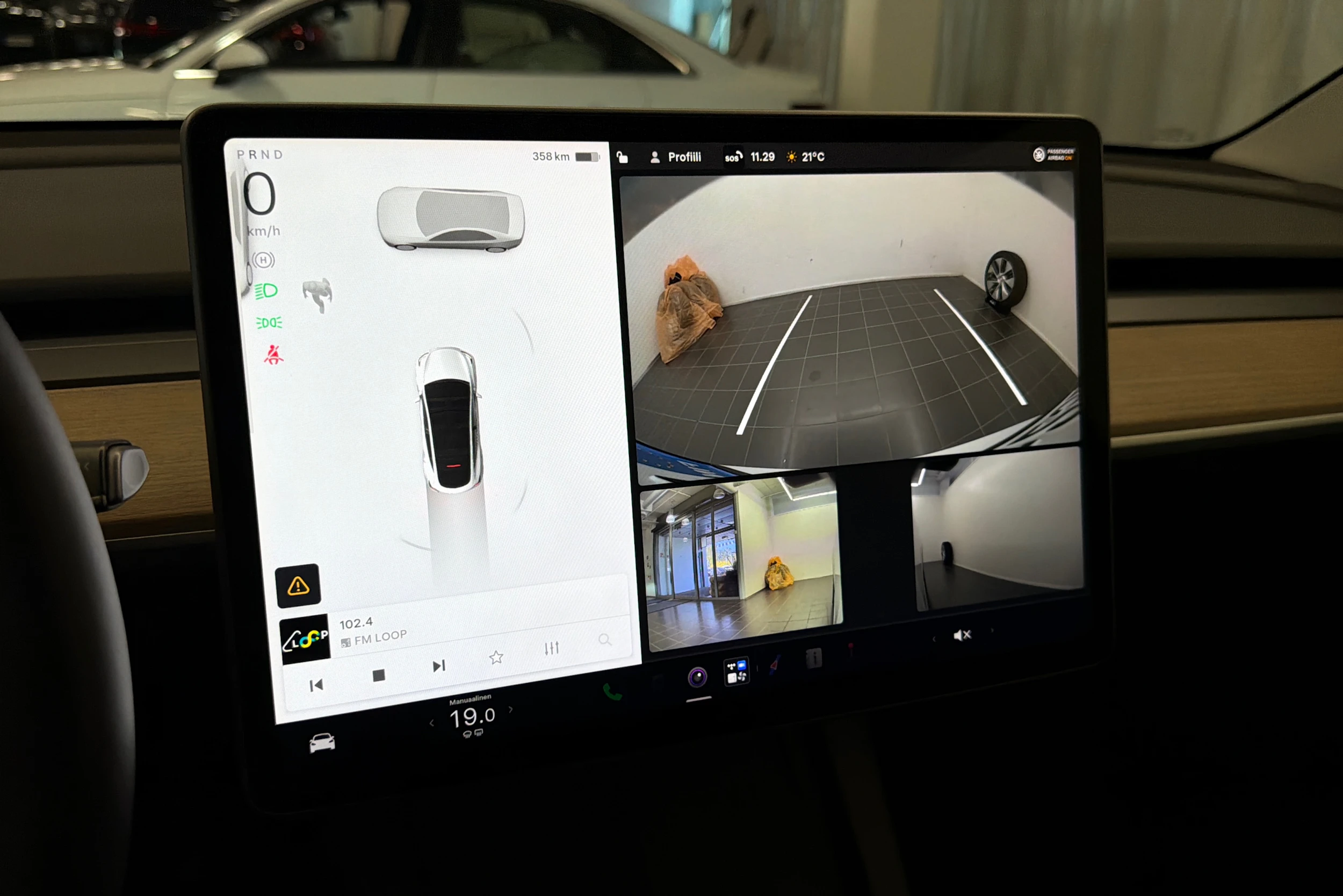 valkoinen Tesla Model Y 2022 kuva 28.