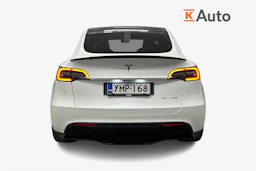 valkoinen Tesla Model Y 2022 kuva 4.