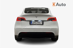 valkoinen Tesla Model Y 2022 kuva 3.