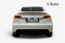 valkoinen Tesla Model Y 2022 kuva 3.