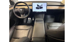 met. musta Tesla Model Y 2023 kuva 6.