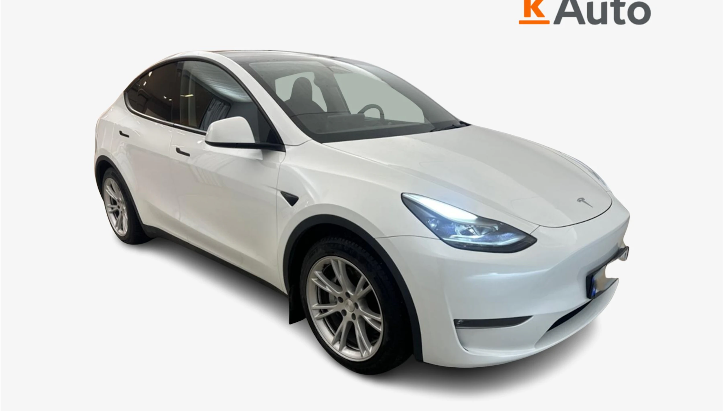 met. valkoinen Tesla Model Y 2023 kuva 1.
