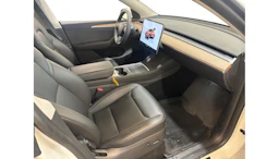 met. valkoinen Tesla Model Y 2023 kuva 4.