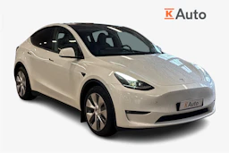 valkoinen Tesla Model Y 2023 kuva 1.
