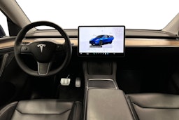 sininen Tesla Model Y 2023 kuva 9.