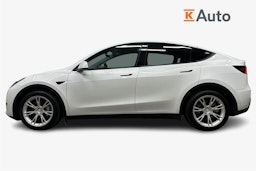 valkoinen Tesla Model Y 2023 kuva 6.