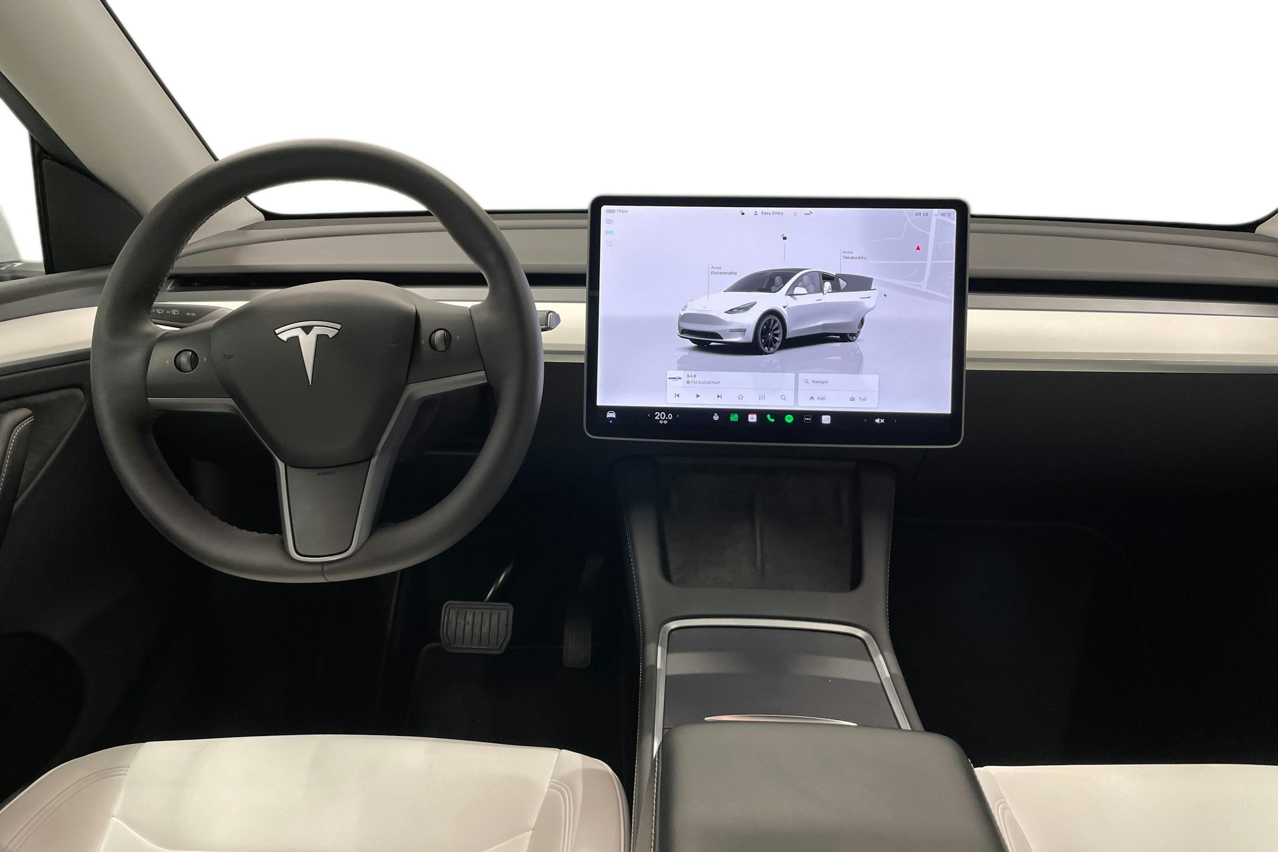 valkoinen Tesla Model Y 2023 kuva 9.
