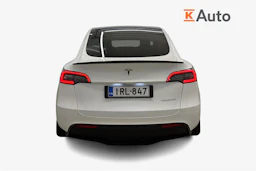 valkoinen Tesla Model Y 2023 kuva 4.