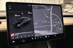 musta Tesla Model Y 2023 kuva 16.