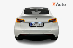 valkoinen Tesla Model Y 2023 kuva 3.