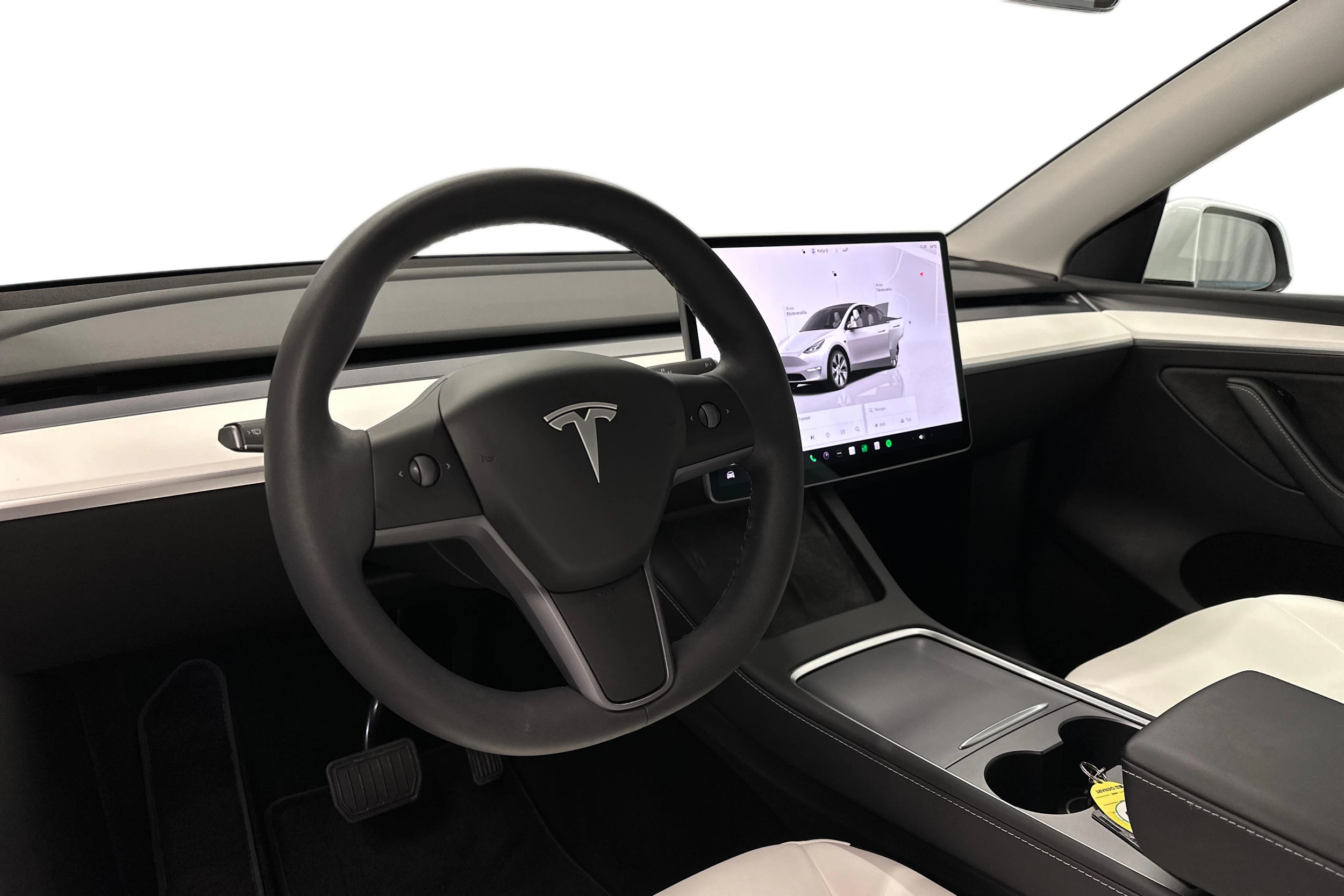 valkoinen Tesla Model Y 2023 kuva 6.