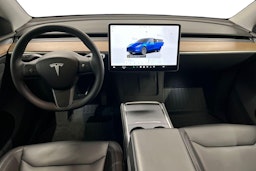 sininen Tesla Model Y 2023 kuva 9.