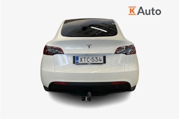 valkoinen Tesla Model Y 2023 kuva 3.