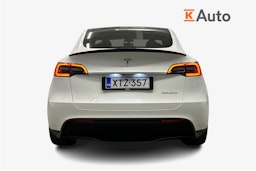 valkoinen Tesla Model Y 2023 kuva 3.