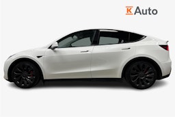 valkoinen Tesla Model Y 2023 kuva 6.