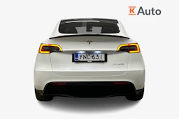 valkoinen Tesla Model Y 2023 kuva 4.