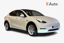 valkoinen Tesla Model Y 2023 kuva 1.